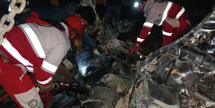 عکس | مرگ فجیع 2 نفر در تصادف وحشتناک و له شدن پژو زیر تریلی